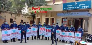 বগুড়ার দুপচাঁচিয়ায় থানার সচেতনতামূলক ৯৯৯ ফেসটুন প্রদর্শন ও মাস্ক বিতরণ