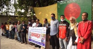 সুনামগঞ্জের কাইয়ারগাওঁ গ্রামে বাড়িঘরে হামলা ভাংচুর ,লুটপাঠ দোষীদের গ্রেপ্তারের দাবীতে মানববন্ধন